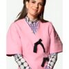 Taskmaster AU S03 Emma Holland Black Bows Pink Wrap Dress